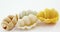 Various conchiglie pasta on white background