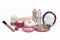 Various cute and feminine pink beauty products