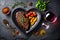 Various degrees of doneness of beef steak in the shape of half a heart with spices and vegetables on a stone dark
