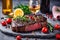 Various degrees of doneness of heart-shaped beef steak with spices, vegetables and a glass of wine on a dark stone