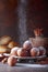 Various donuts powdered with sugar on a brown background