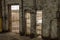 Various doorways in a brick building of an abandoned factory