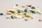 Various drugs, tablets and needles, background.