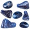Various dumortierite gem stones isolated on white