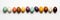 Various Easter eggs aligned on white background banner. Panoramic web header. Wide screen wallpaper