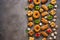 Various Eastern sweets on a rustic brown background. Baklava, delight, cookies. Top view, copy space