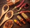 Various fragrant Herbs and Spices over wooden background