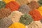 Various fragrant spice market. Spice and seasoning. Heap different Asian Spices lies on wooden background. Assortment