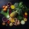 Various fresh healthy raw organic vegetables, herbs and fruits on dark background, top view.