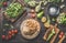 Various fresh ingredients around tortilla or flatbread for tasty vegan wraps making. Fresh salad ingredients: avocado, lemon,