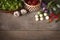 Various fresh, young homegrown vegetables, tomato, chilli, lettuce, Eggplant, garlic place on a wooden table