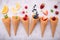 Various of fruits  in cones blueberry ,strawberry ,raspberries and strawberry setup on white stone background . Summer and Sweet