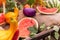 Various fruits, watermelons, pumpkins and vegetables on a cart during the autumn holiday. Selective focus