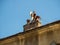 Various fun chimneys on the tiled roof of the house in the city of Edessa, Greece
