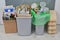 Various garbage for recycling in box. Paper, cardboard, metal and glass prepared for recycling. Waste to be recycled. Trash for