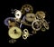 Various gears for watch movements, golden and silver colors