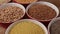 Various gluten free seeds and grains in bowls - close up, camera slide above