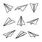 Various hand drawn paper planes. Black doodle airplanes. Aircraft icon, simple monochrome plane silhouettes. Outline