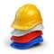 Various hard hats, safety helmets on white.