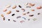 Various hearing aids on white background, alternative to surgery. ENT accessory.