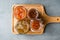 Various Jar of Fruit Jams Fig, Quince, Bergamot Citrus, Watermelon on Wooden Tray / Marmalade.