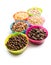 Various kids cereals in plastic bowls