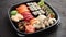 Various kinds of sushi on plate or platter set