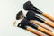 Various makeup brushes isolated over white