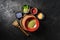 Various matcha tea powders on a dark concrete background. Top view