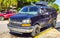 Various minibuses vans transporters vehicles cars in Puerto Escondido Mexico