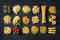 Various pasta over stone background