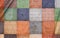 Various pattern of multicolored square shape paving stone floors on the wall decoration display for showing samples to customer