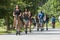 Various People Ride Motorized Scooters Along Atlanta Beltline Trail