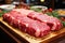 Various pieces of fresh raw red meat in the supermarket, beef, pork, assorted meat steaks on a wooden board.