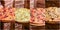Various pizza and pizza ingredient foods together in a collage. Pizza, pizza rolls, toppings, dip. Banner.