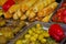 Various prepared foods are on the trays.