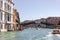 Various public and private water transport moving along the river canal in Venice city, Italy