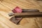 Various Sandpaper and Oak Wood on Pine Workbench