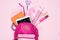 Various school supplies in schoolbag