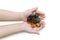 Various semiprecious stones in the hands of a child on a white background, isolate
