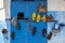 Various sets of shoes hanging on a blue doorway at Kasbah des Oudaias in Rabat in Morocco.