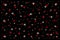 Various sizes and mixed white, red stars on a black background