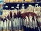 Various sizes paint brushes on shelf display in stationery shop, Art painting tool shopping concept, soft brown brushes for