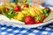 Various sliced fruits on plate