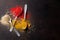 Various spices spoons on stone table