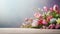 various spring flowers on table with copy space