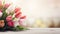 various spring flowers tulips on table with copy space