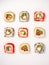 Various sushi on white background, top view