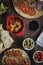 Various tapas dishes cheese and wine on a wooden table