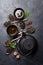 Various tea in spoons and teapot. Black, green and red tea